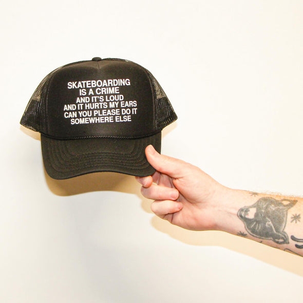 Skateboarding is a Crime Trucker Hat