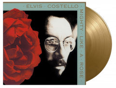 Elvis Costello Mighty Like A Rose (Limited Edition, 180 Gram Vinyl, Colored Vinyl, Gold) [Import] - (M) (ONLINE ONLY!!)