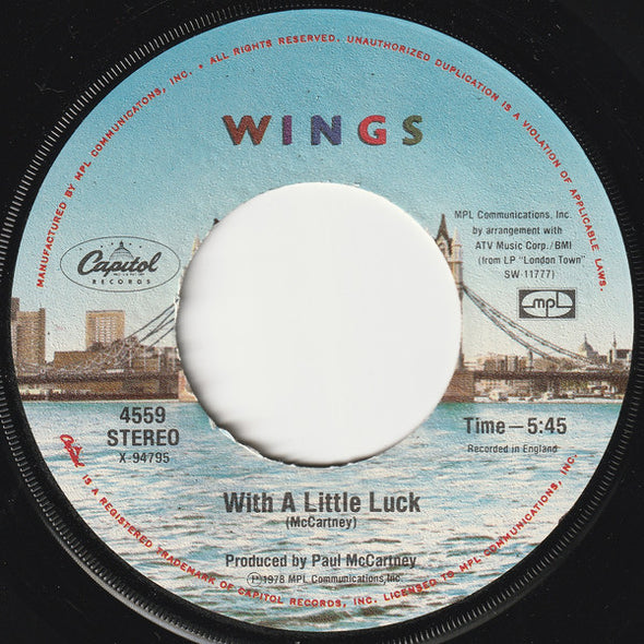 Wings (2) : With A Little Luck (7", Single, Win)