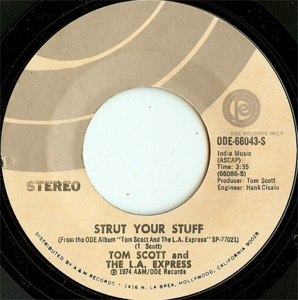 Tom Scott And The L.A. Express : Strut Your Stuff / Sneakin' In The Back (7", Styrene, Ter)