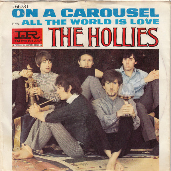 The Hollies : On A Carousel (7", Single, Styrene, She)