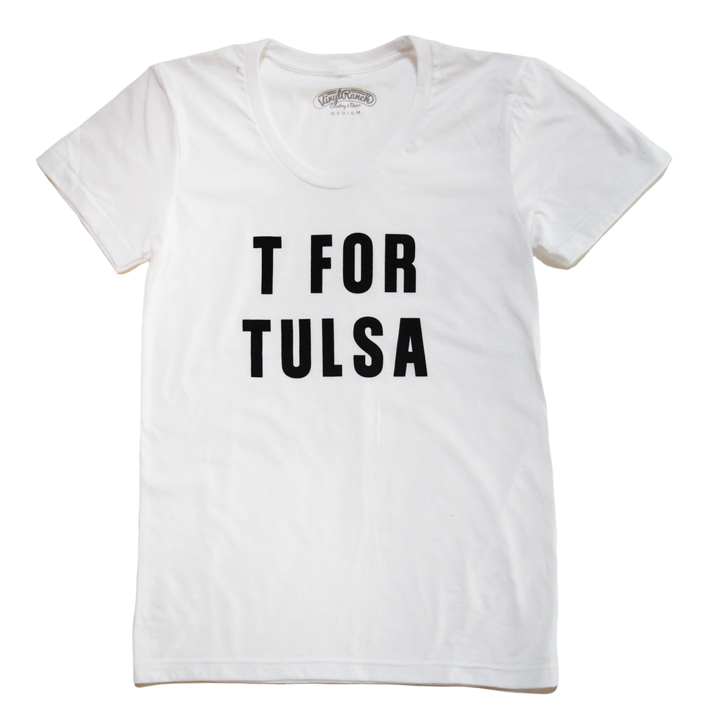 "T For Tulsa" by Vinyl Ranch is a nod to T-Town, printed on a women's white scoopneck tee.