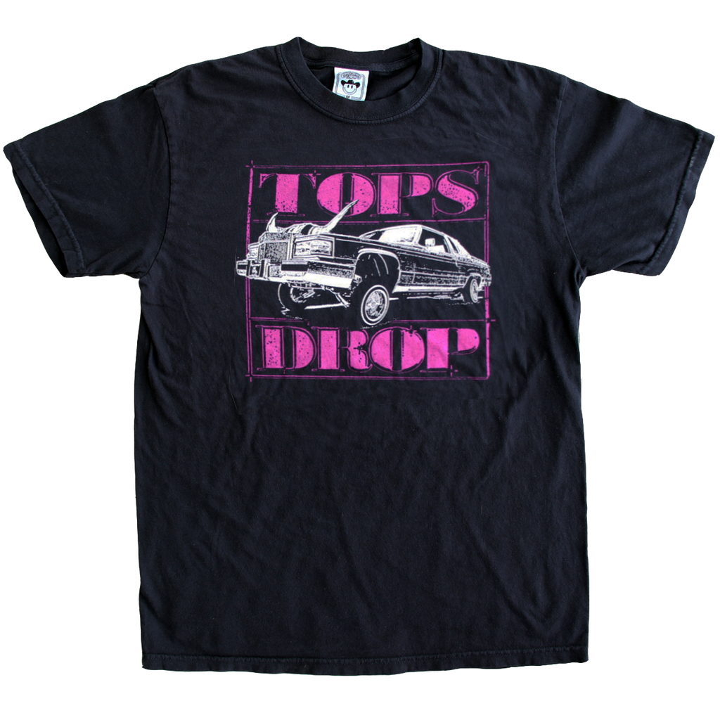 "Tops Drop" is printed with purple ink on a classic black tee by Vinyl Ranch.  Check out the full Rodeo Screwston Collection