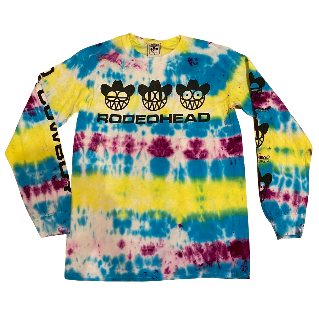"OK Cowboy Rodeohead" by Vinyl Ranch is a limited edition tie-dye version of this design printed on a longsleeve tee. These are individually dyed, one of a kind, and each tee is unique.  NO EXCHANGES ON THESE ITEMS